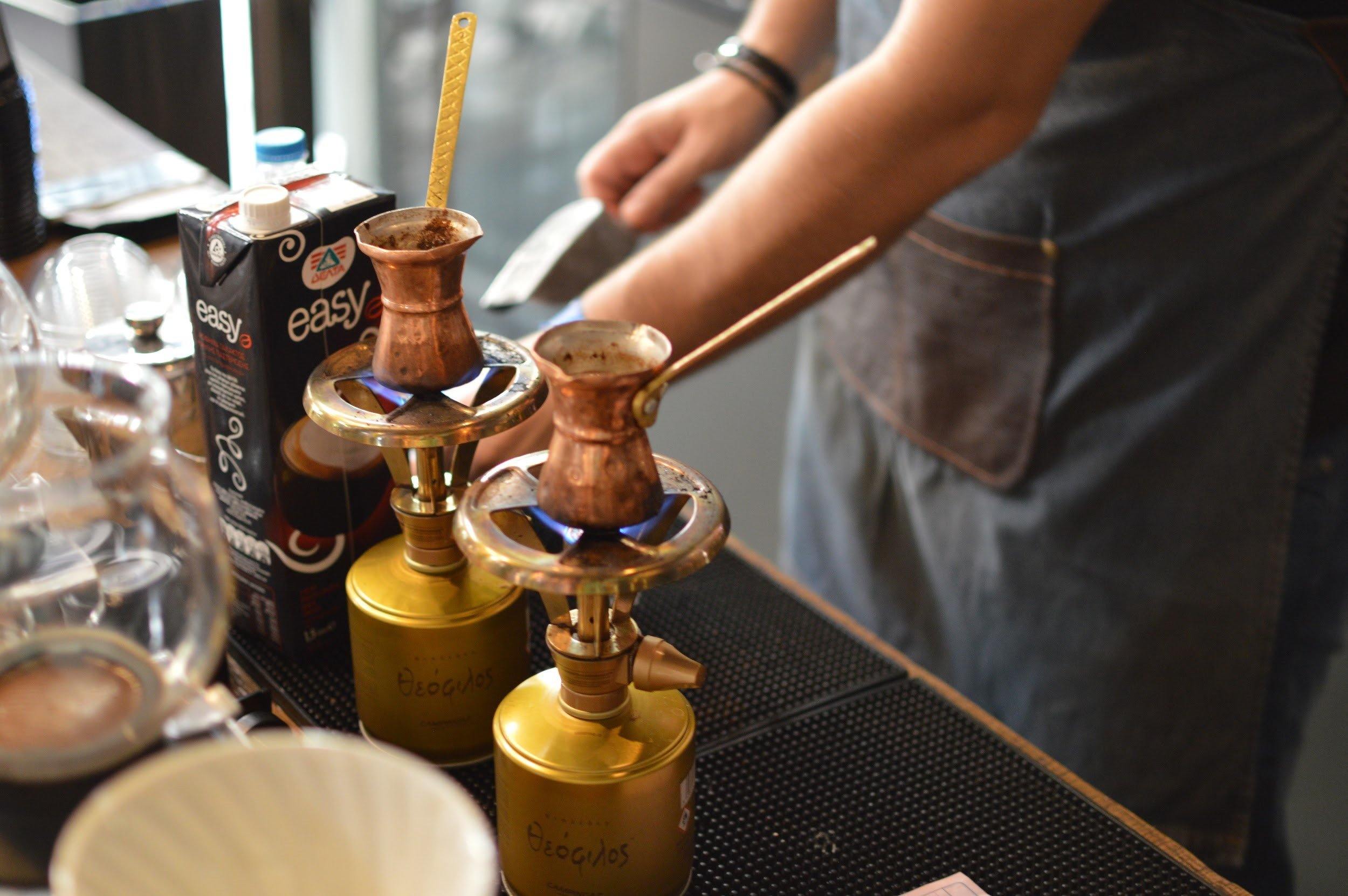 Modern Turkish coffee preparation with contemporary style